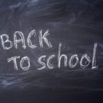 Blackboard with 'Back to School' written in chalk, ideal for educational themes.
